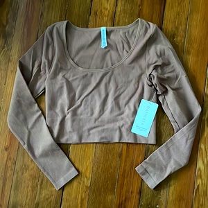 athleta aurora seamless top. new never worn with tags. ordered the wrong size!